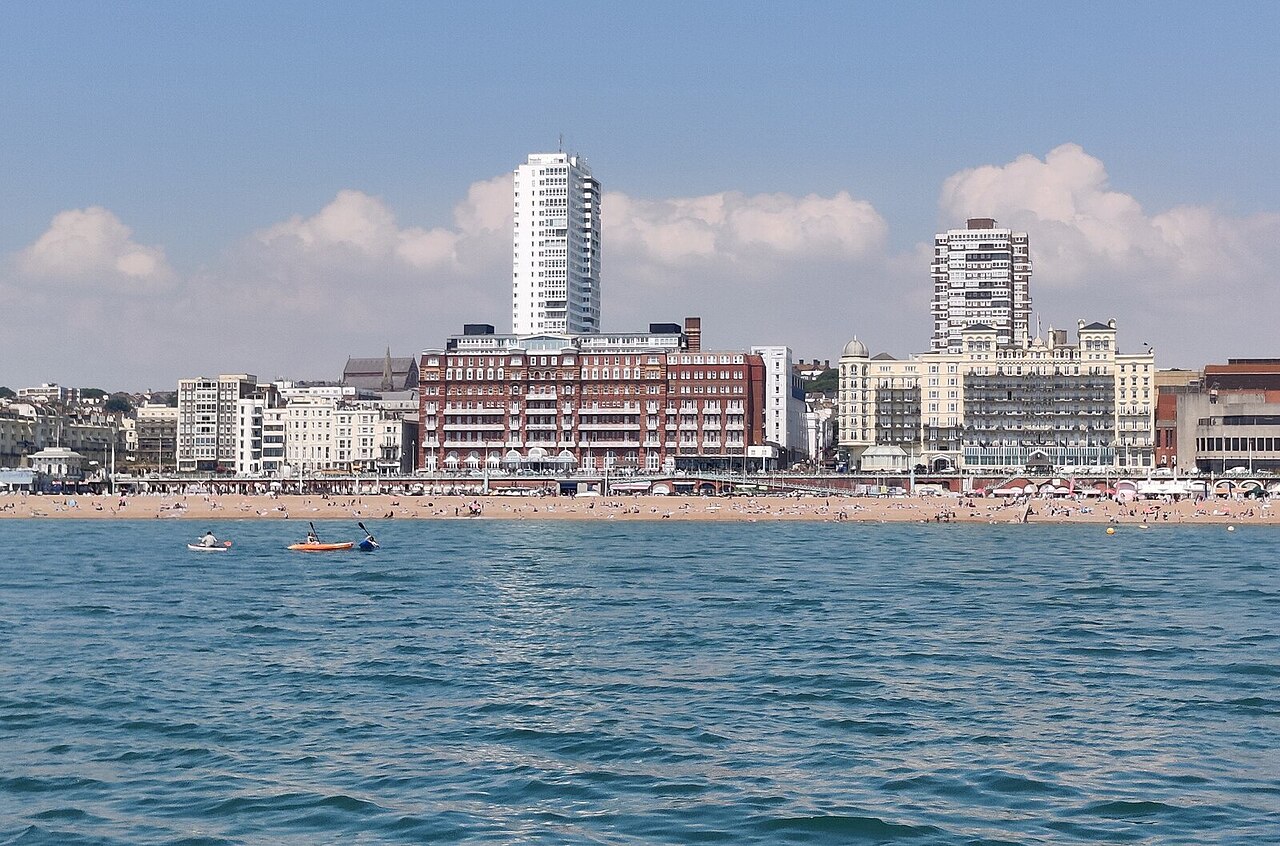 Brighton seafront, pebble beach and promenade looking along the coast